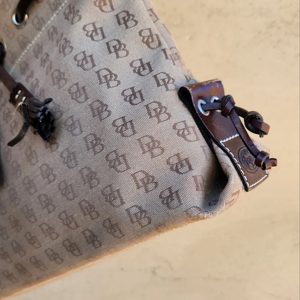 Dooney & Bourke Signature Canvas Tassel Tote Bag - Picture 8 of 13